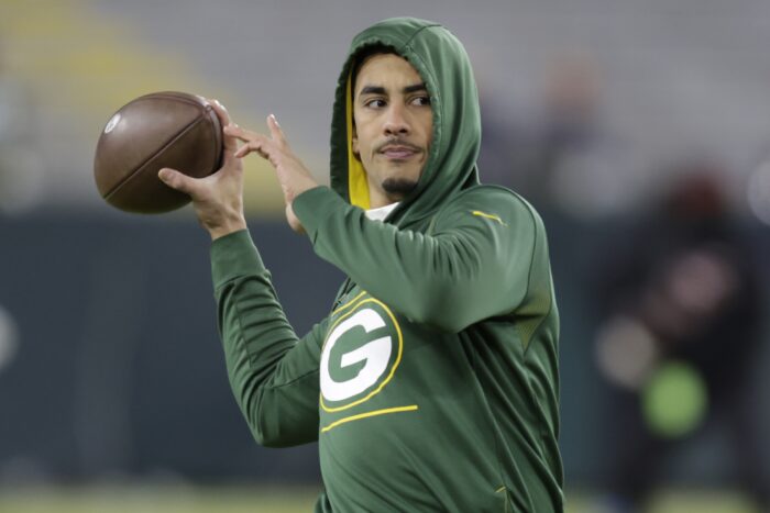 Green Bay Packers' Jordan Love warms up before an NFC divisional playoff NFL football game against the San Francisco 49ers Saturday, Jan. 22, 2022, in Green Bay, Wis. (AP Photo/Matt Ludtke)