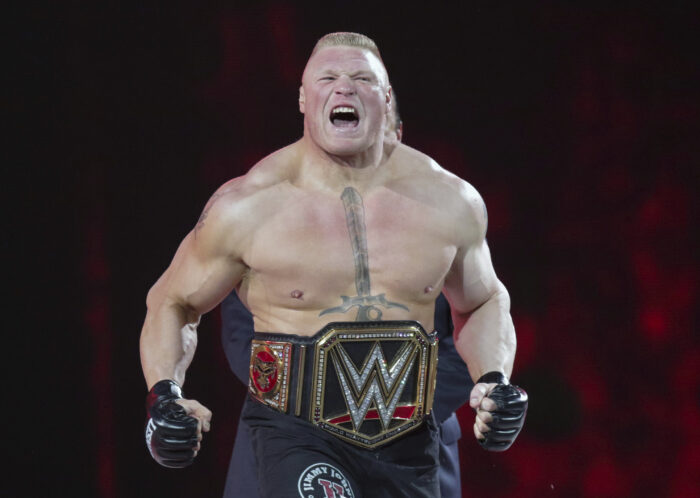 FILE - In this March 29, 2015, file photo, Brock Lesnar makes his entrance at Wrestlemania XXXI in Santa Clara, Calif.   Lesnar takes on Universal Champion Roman Reigns in a unification bout in Sunday, April 3, 2022 Wrestlemania main event at AT&amp;T Stadium in Arlington, Texas.     (AP Photo/Don Feria, File)
