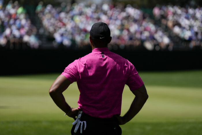 Tiger Woods waits to play on the fifth hole during the first round at the Masters golf tournament on Thursday, April 7, 2022, in Augusta, Ga. (AP Photo/Jae C. Hong)