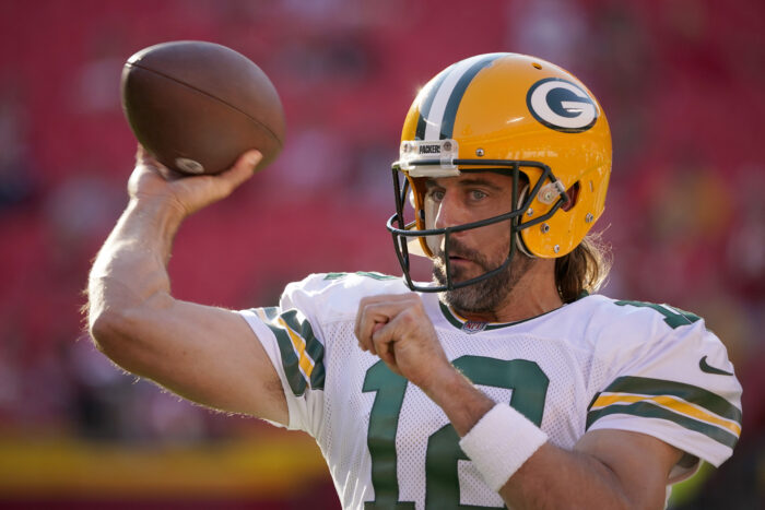 FILE - Green Bay Packers quarterback Aaron Rodgers warms up before the start of an NFL preseason football game between the Kansas City Chiefs and the Green Bay Packers, Thursday, Aug. 25, 2022, in Kansas City, Mo. The Packers’ chances of continuing that uncanny level of success will depend on how fast reigning MVP quarterback Aaron Rodgers develops chemistry with his new group of receivers. (AP Photo/Ed Zurga, File)