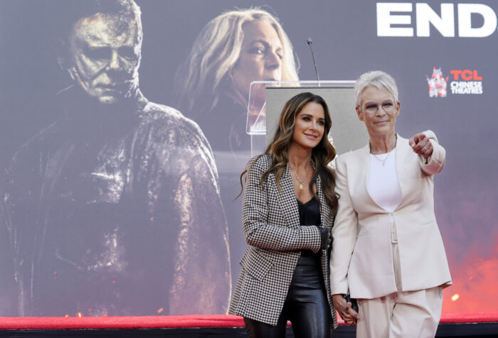 "Halloween Ends" star Jamie Lee Curtis, right, poses with fellow cast member Kyle Richards during a hand and footprint ceremony for Curtis at TCL Chinese Theatre, Wednesday, Oct. 12, 2022, in Los Angeles. Richards appeared in the original "Halloween" horror film in 1978 with Curtis when she was eight years old. (AP Photo/Chris Pizzello)