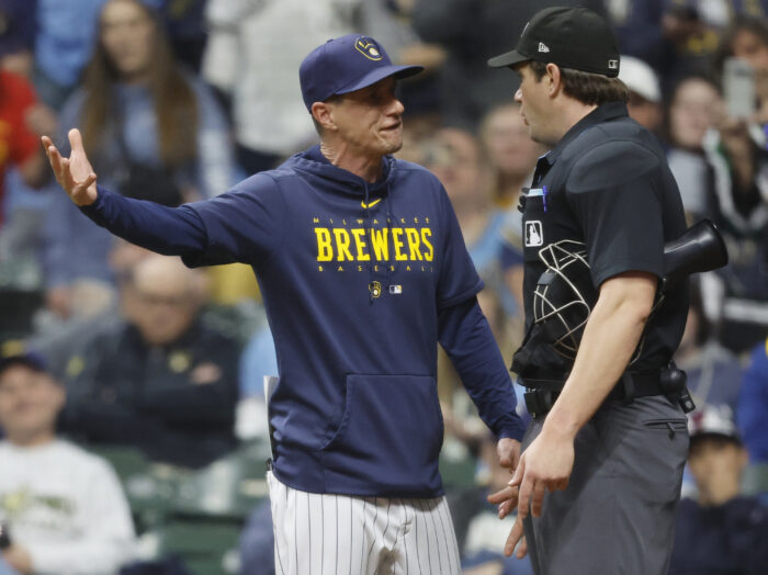 Milwaukee Brewers manager Craig Counsell, left, argues with home plate umpire Adam Beck during the seventh inning of a baseball game against the Los Angeles Angels, Saturday, April 29, 2023, in Milwaukee. (AP Photo/Jeffrey Phelps)