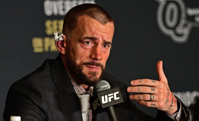 CM Punk speaks during the post fight press conference after his submission loss to Mickey Gall in a middleweight bout at UFC 203 on Saturday, Sept. 10, 2016, in Cleveland.  (AP Photo/David Dermer)