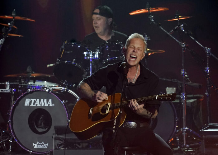 James Hetfield, right, and Lars Ulrich of Metallica perform during "Metallica Presents: The Helping Hands Concert," Friday, Dec. 16, 2022, at Microsoft Theater in Los Angeles. (AP Photo/Chris Pizzello)