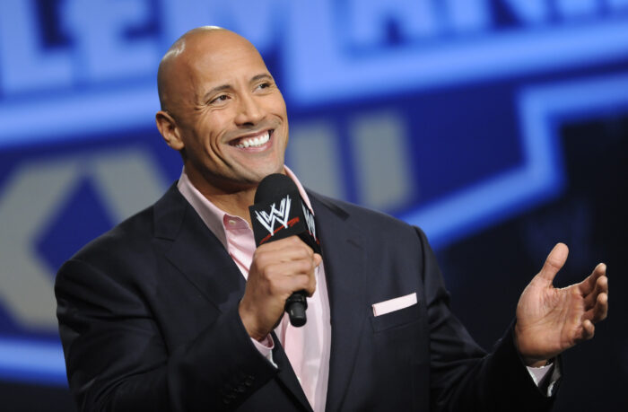 FILE - Actor and former WWE Superstar Dwayne "The Rock" Johnson participates in a Wrestlemania XXVII press conference at the Hard Rock Cafe in Times Square on Wednesday, Mar. 30, 2011 in New York.  It is a name that has become almost synonymous with professional wrestling but its bearer, Dwayne Johnson, has never legally owned “The Rock.” That will change under a new agreement with the WWE under whichJohnson will also join the board of TKO Group, the sports and entertainment company that houses WWE and UFC.(AP Photo/Evan Agostini, file)